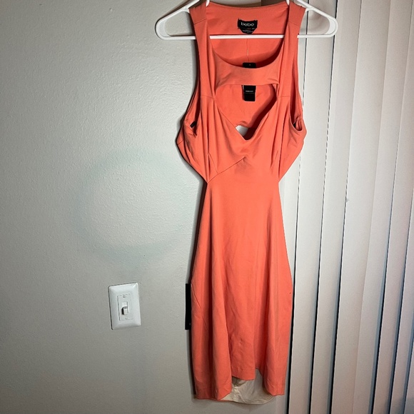 bebe Dresses & Skirts - New With Tags Bebe Y2k Coral Cutout Dress. Mini length in a size large